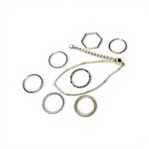 Jewelry bracelet & 7 rings - brand new - shiny gold tone​